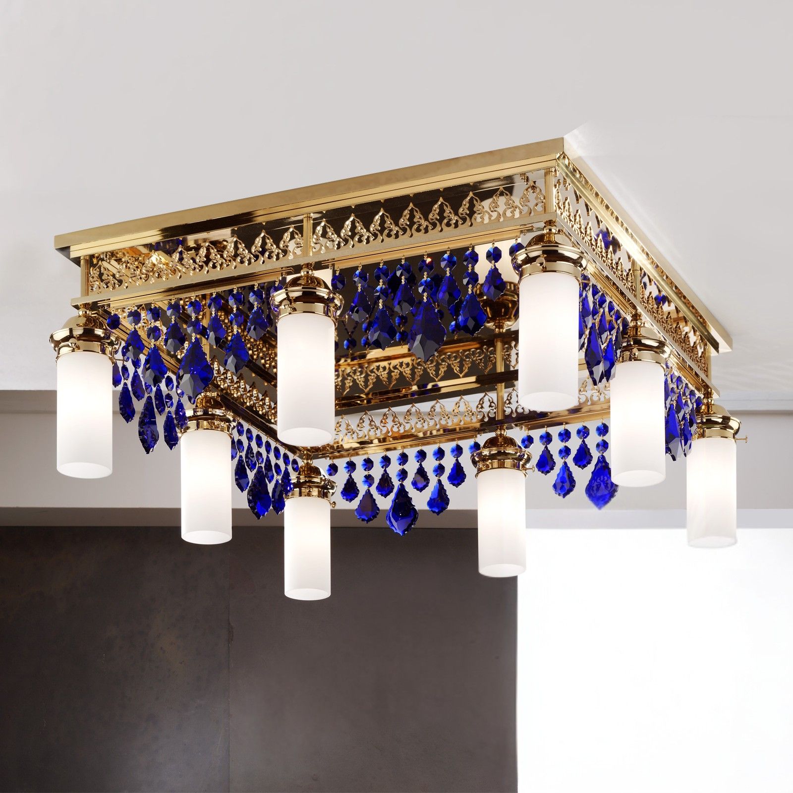 Deckenluster ORIONtal, 8-flammig, gold, mit blauen Kristallpendeln