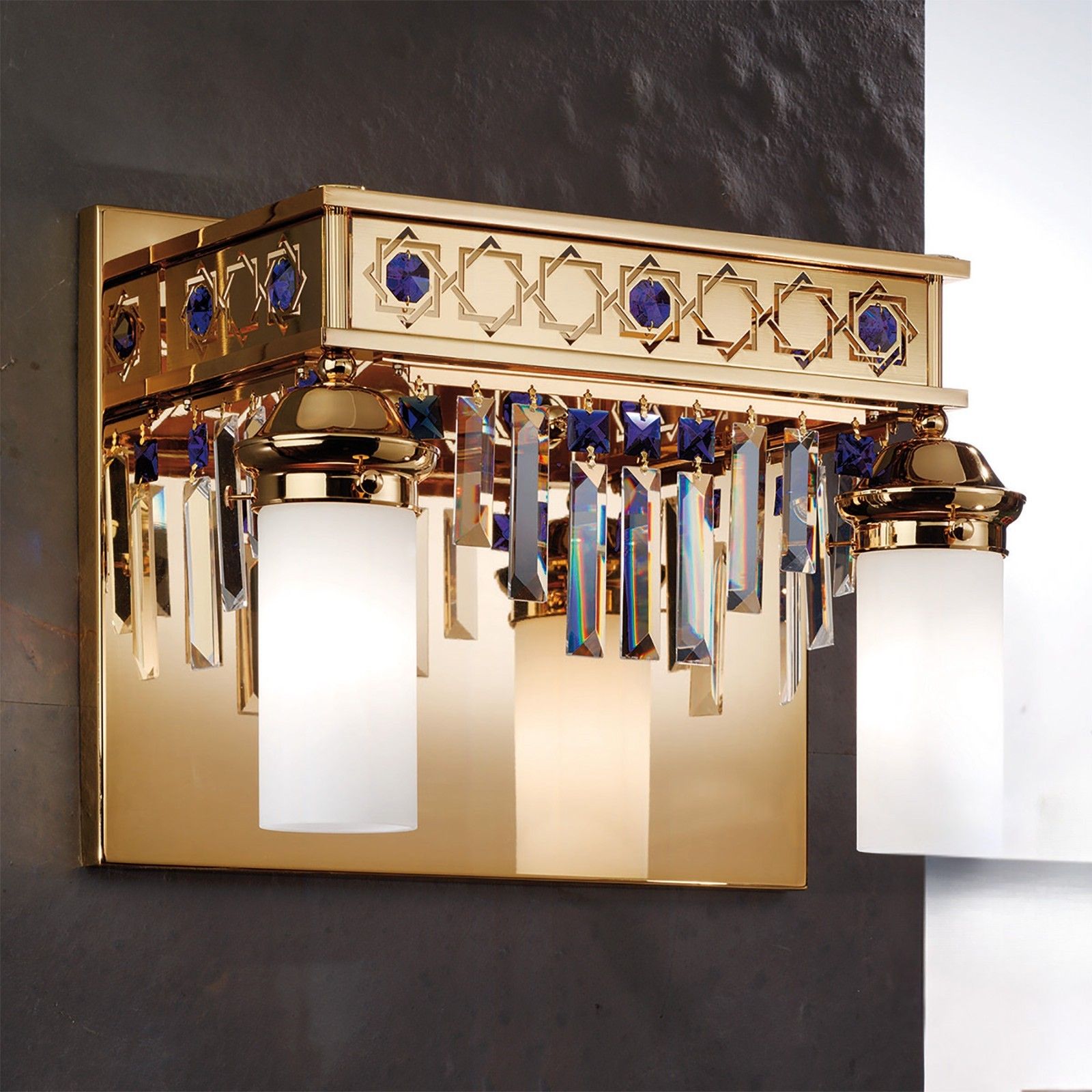 Wall light ORIONtal, 2-flames, gold, with blue crystal prisms