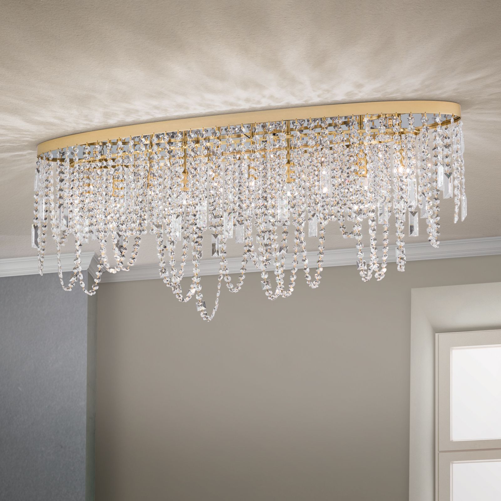 Ceiling light KRISTALLDESIGN in oval shape, 110x25cm, 24K gold plated