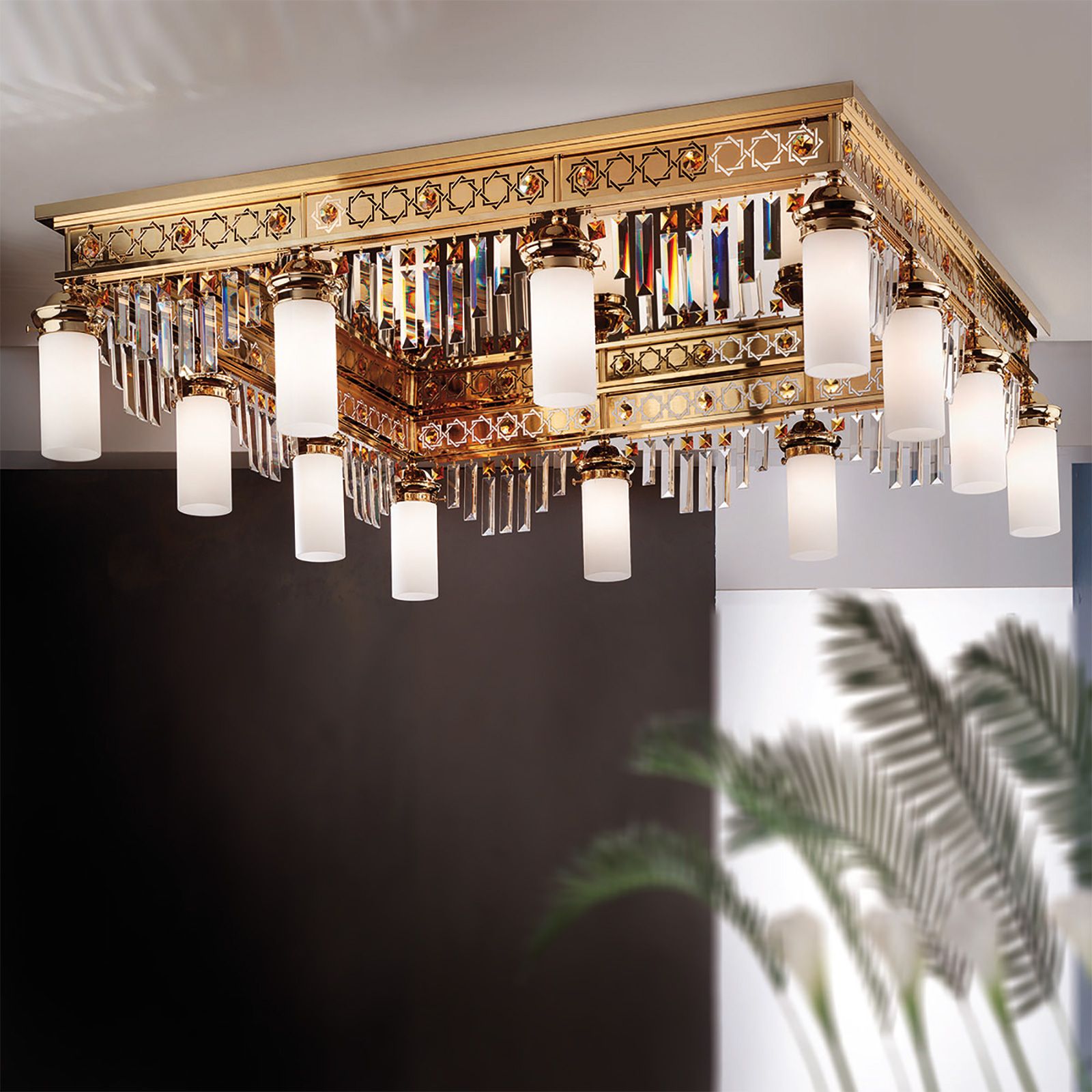 Ceiling chandelier ORIONtal, 12-flames, gold, with topaz-coloured crystal prisms